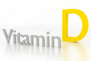vitamin d 3d illustration on white glossy surface